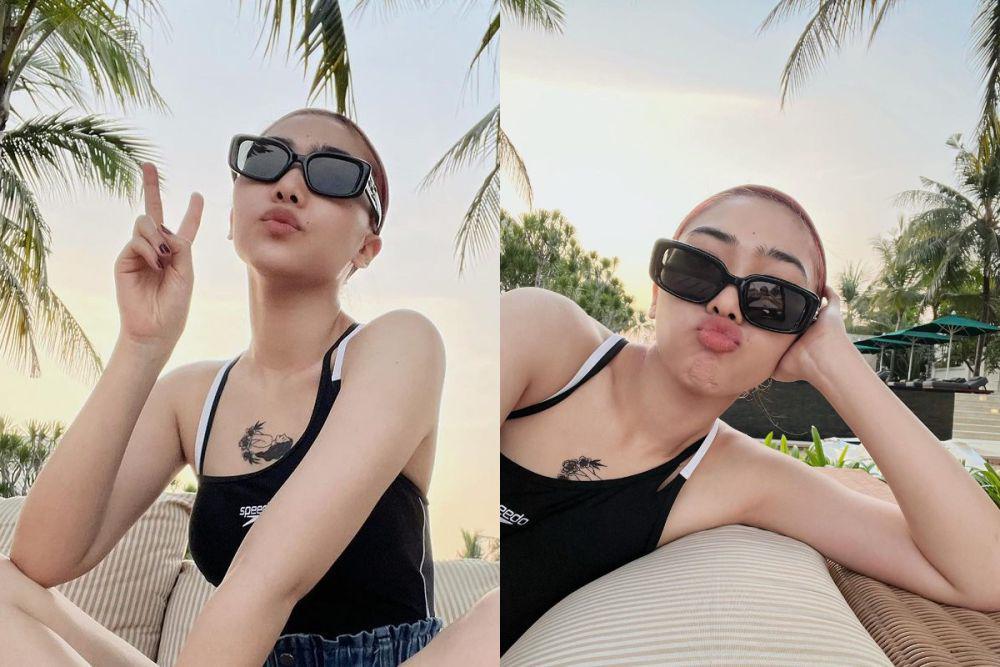 7 Potret Isyana Sarasvati Pamer Tato saat di Pantai