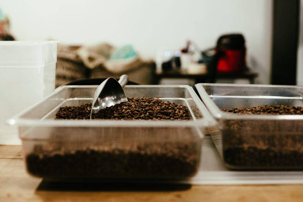 ilustrasi kopi arabika di dalam kotak (unsplash.com/Aaron Doucett)