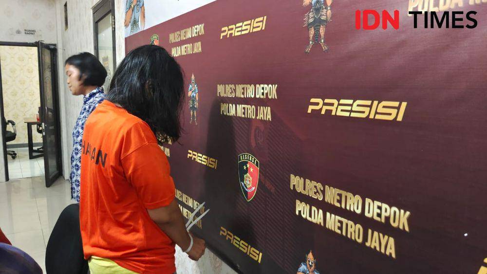 Tersangka RAD yang ditangkap Polres Metro Depok usai menjual anak kandungnya kepada WNA. (IDNTimes/Dicky)
