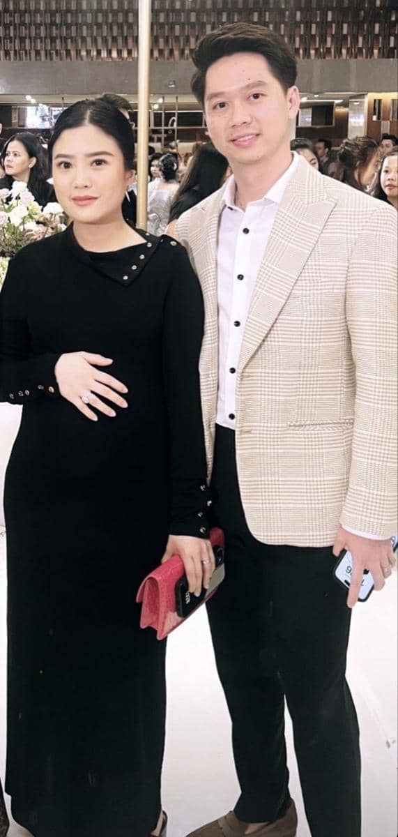 Valencia Tanoe dan Kevin Sanjaya di resepsi Jonatan Christie dan Shanju. (Instagram.com/desygenoveva_)