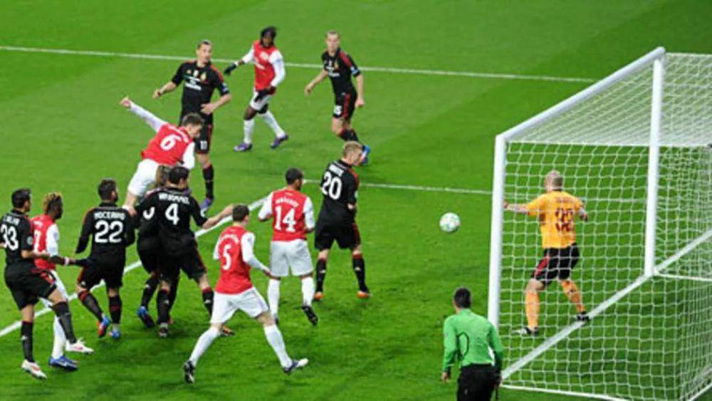 Arsenal menang 3-0 atas AC Milan di babak 16 besar Liga Champions 2011/2012. (arsenal.com)