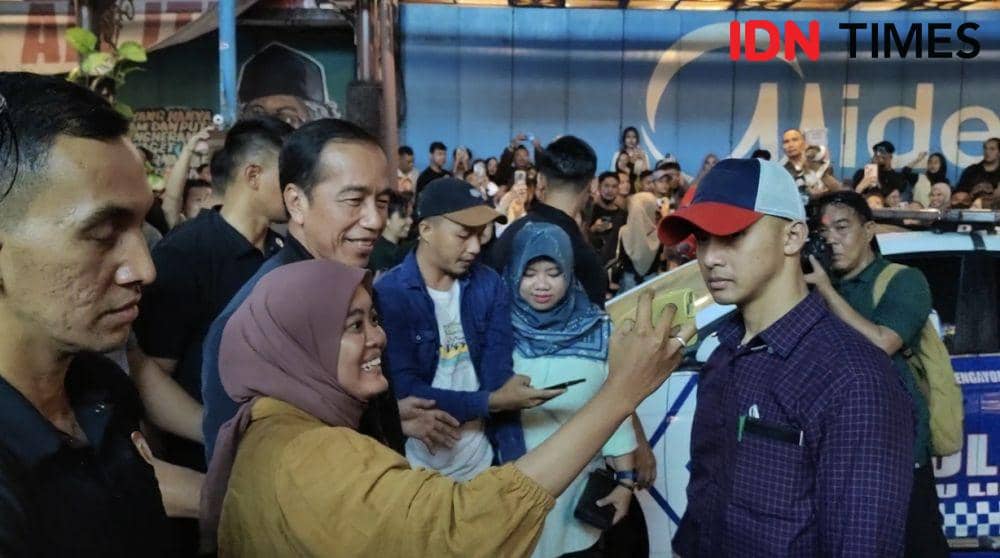 Presiden Jokowi menyapa warga Solo di penghujung tahun. (IDN Times/Larasati Rey)
