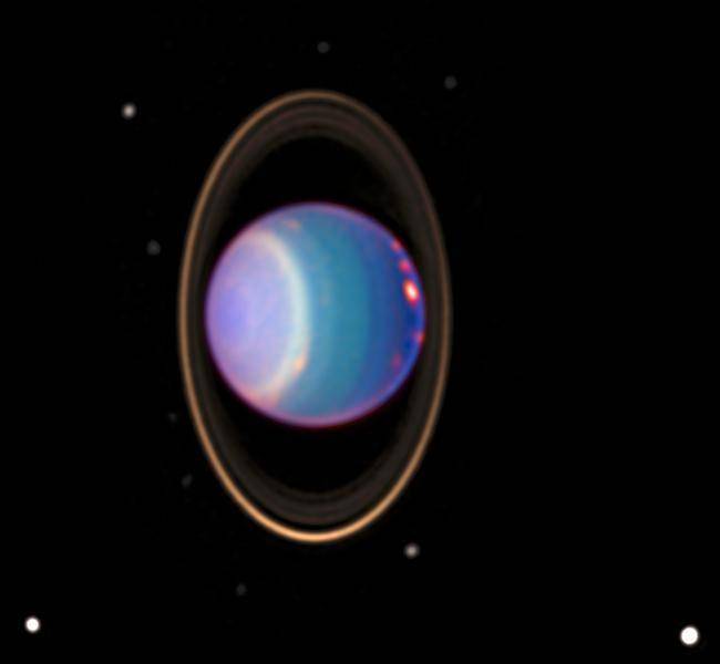 potret Uranus beserta awan-awan berwarna cerahnya hasil tangkapan Teleskop Hubble (commons.wikimedia.org/NASA Hubble