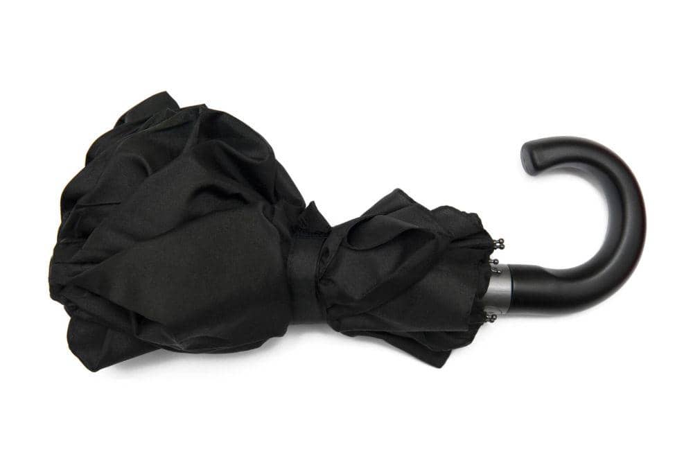 ilustrasi payung lipat yang stylish\ (istockphoto.com/Issaurinko)