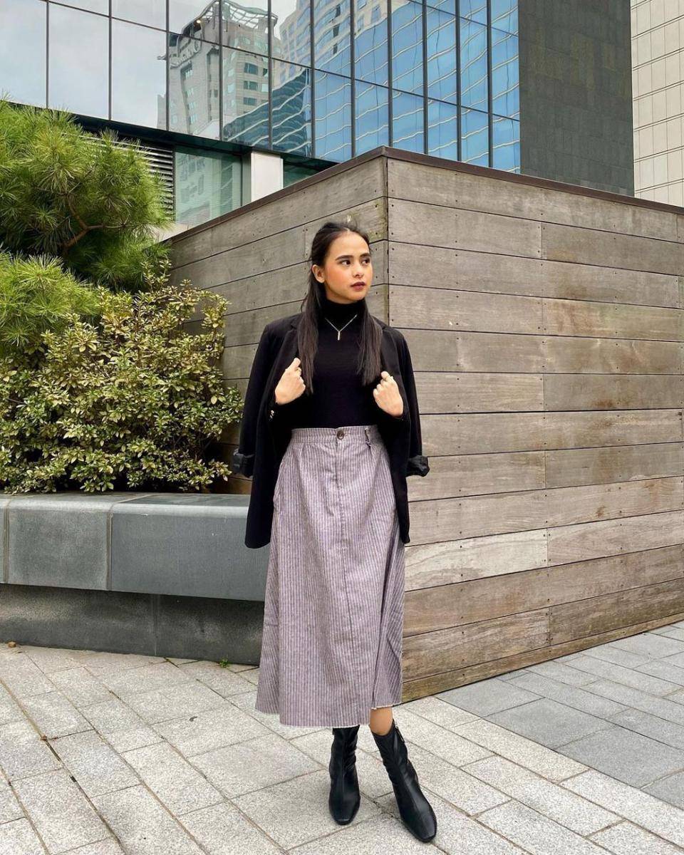 ide outfit liburan ala Cathy Fakandi (instagram.com/cathyfakandi)