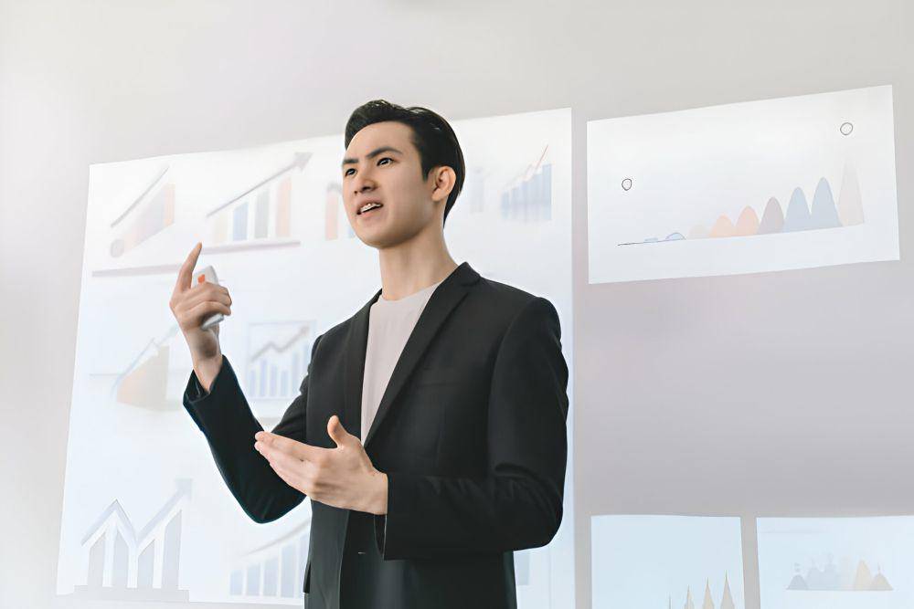 ilustrasi pria memimpin rapat (istockphoto.com/Patrick Chu)