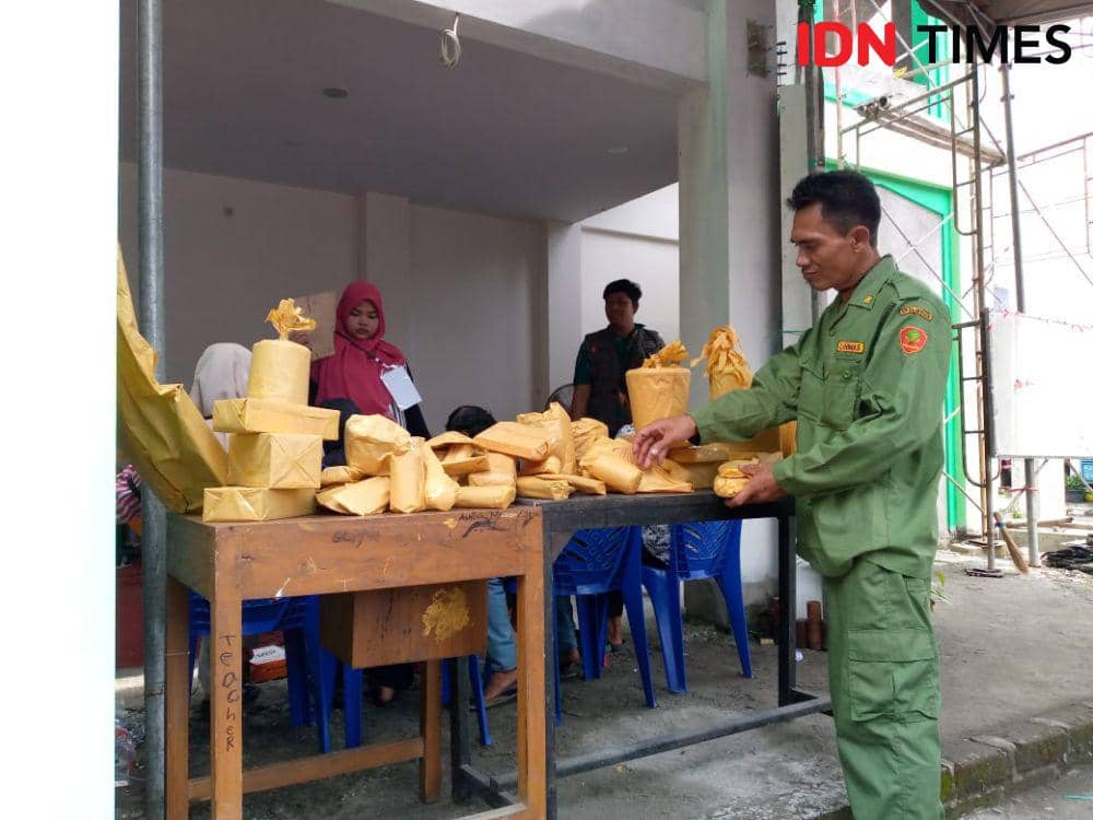 Nyoblos Berhadiah di TPS 02 Lamongan Ini Bikin Warga Antusias