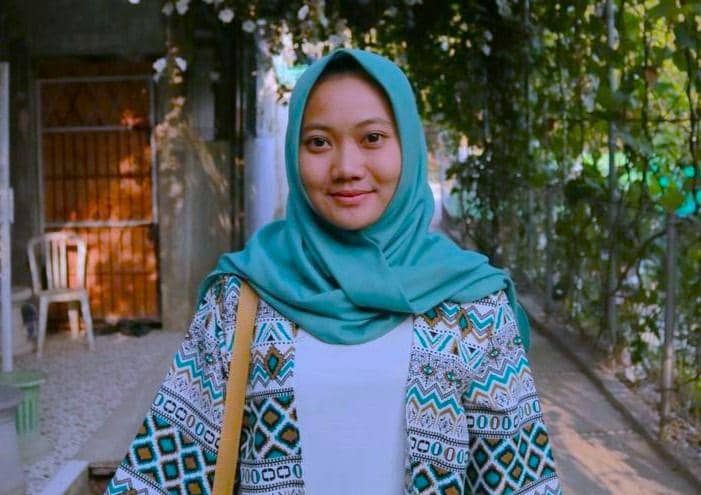 Shella Pradila (26), petugas Kelompok Penyelenggara Pemungutan Suara (KPPS) yang bertugas dalam penyelenggaraan pemungutan dan penghitungan surat suara di TPS wilayah Pademangan. (dok. BPJS Kesehatan)