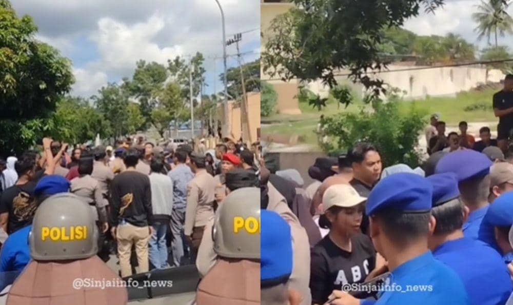 Polisi menangkap pengunjuk rasa anarkistis di depan Kantor KPU Sinjai, Sulawesi Selatan, Sabtu (2/3/2024). (Instagram/Sinjaiinfo_news)