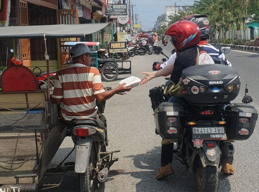 CB150X ADV ID Chapter Asahan Berbagi dengan Sesama