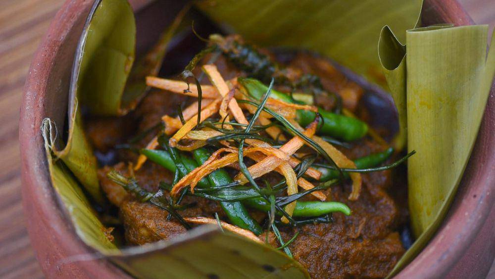 ilustrasi rendang ikan (unsplash.com/Christian Dala)