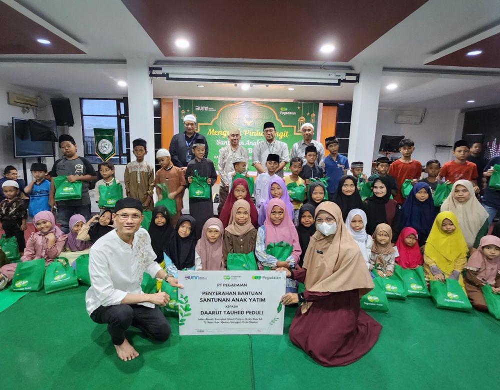 Pegadaian Medan Merangkul Anak Yatim Mengetuk Pintu Langit