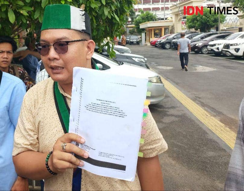 Penampakan LHP auditor independen Dr. Chareoni and Rekan dalam perkara korupsi dana hibah KONI Lampung. (IDN Times/Tama Yudha Wiguna).