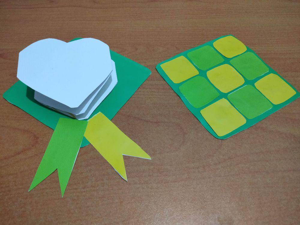 ilustrasi kreasi kertas origami berbentuk ketupat (dok.pribadi/Adelbertha Eva Y)
