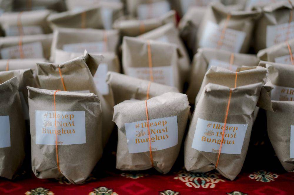 IDN Media beri donasi nasi bungkus di bulan Ramadhan dari hasil unggahan resep masakan di Yummy App. Dok. IDN Media