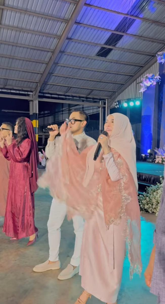 potret Shandy Purnamasari dan suami bagi-bagi bingkisan (instagram.com/shandypurnamasari)