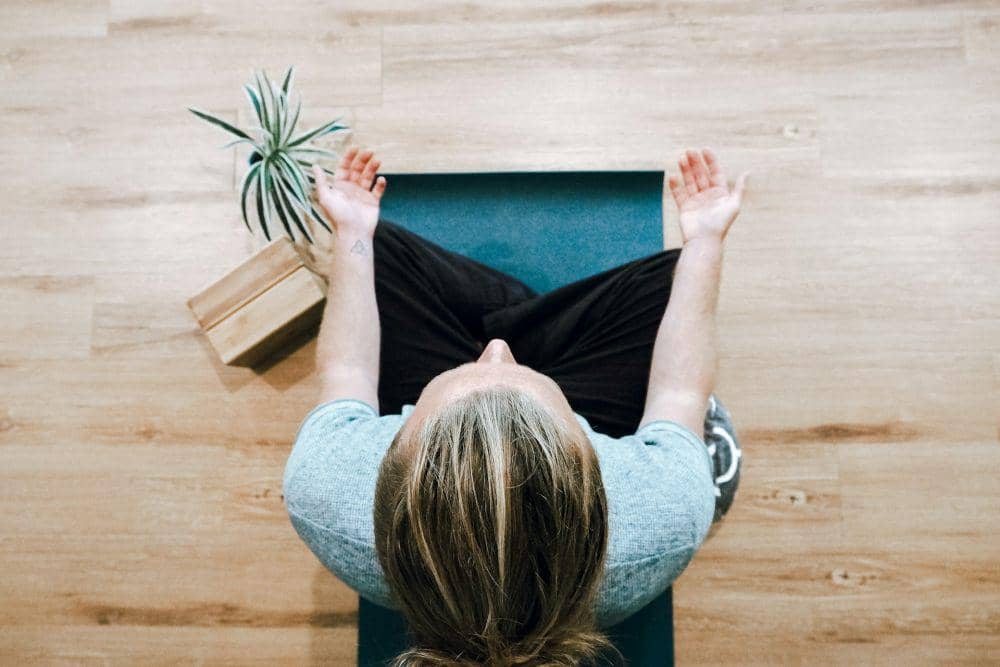https://unsplash.com/photos/woman-in-black-shirt-and-gray-pants-sitting-on-brown-wooden-bench-6CLBoiWuzSU