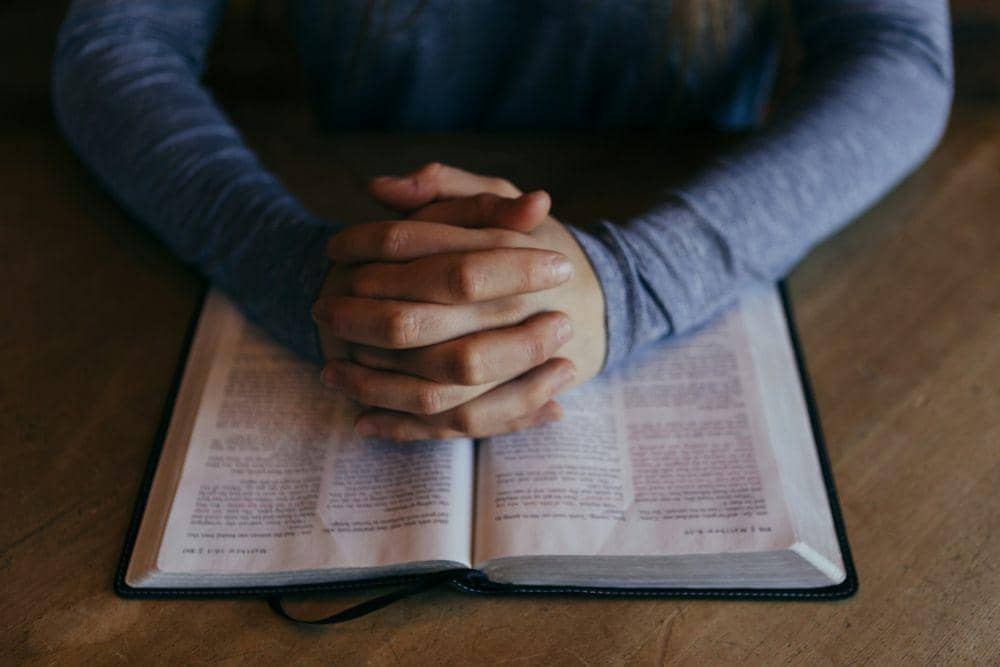 https://unsplash.com/photos/man-holding-his-hands-on-open-book-b_SHPU5M3nk
