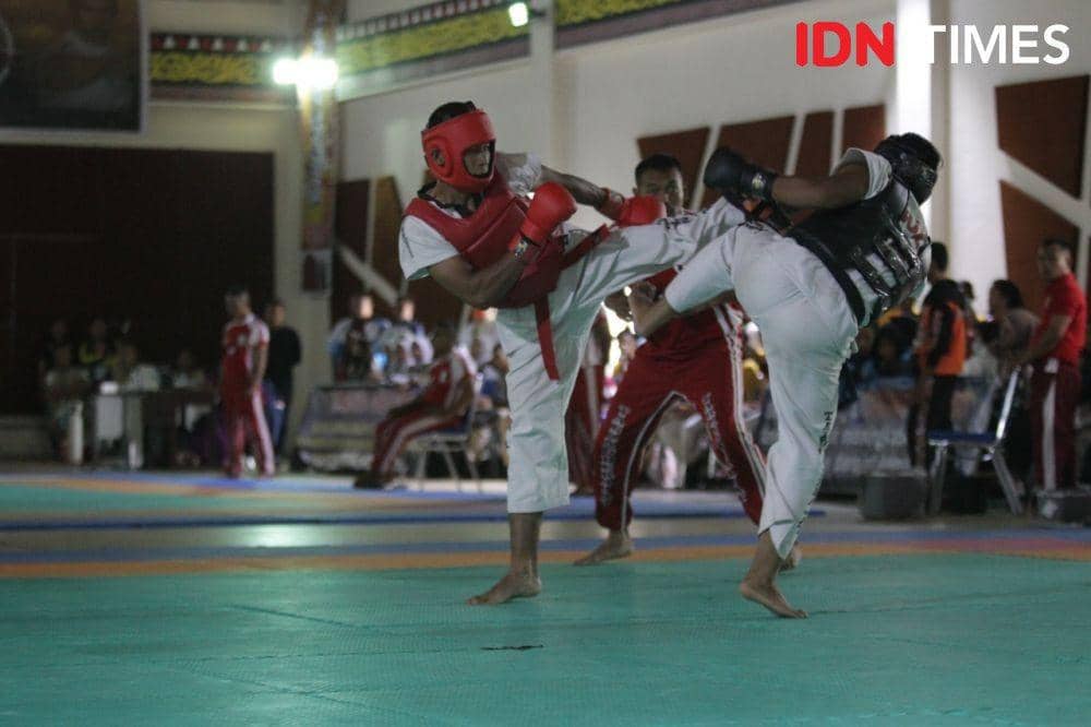 Atlet Tarung derajat Medan, Farhan Attamamil beraksi pada gelaran Porprov Sumut 2022. (IDN Times/Doni Hermawan)