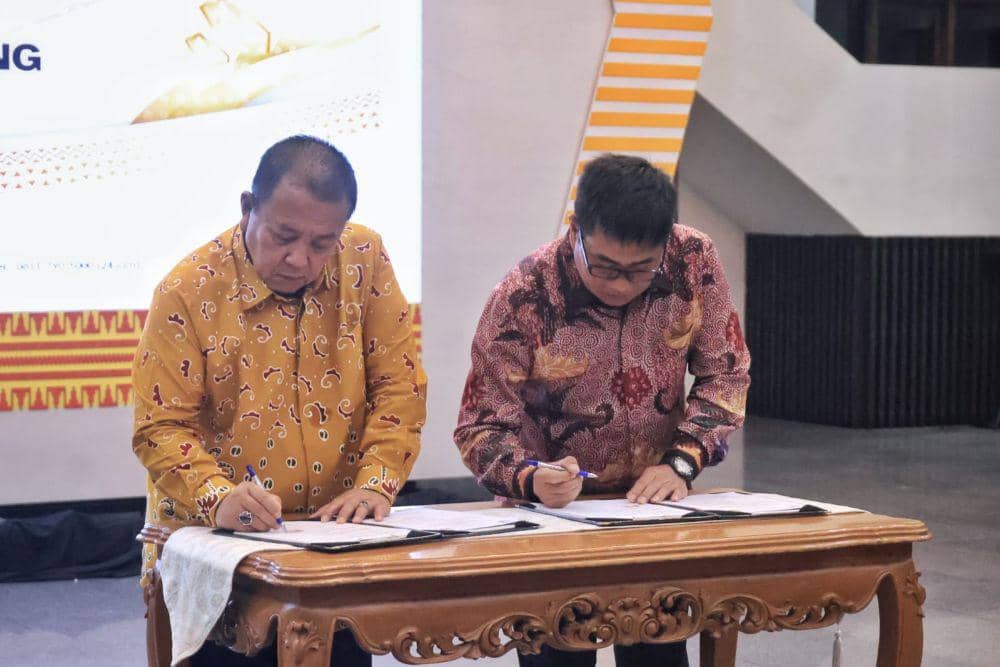 Penandatanganan MoU Pemprov Lampung dengan PT Pusri Palembang. (Dok. Pemprov Lampung).