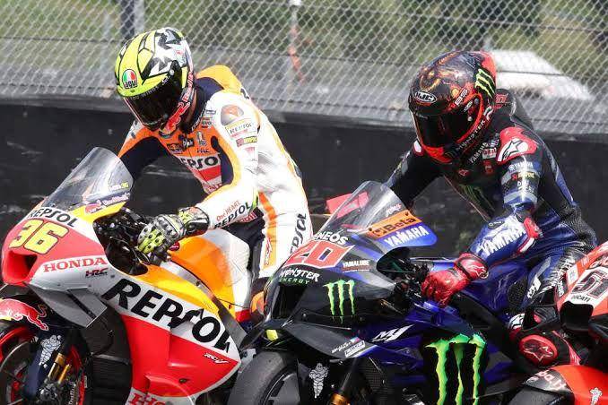 Joan Mir dan Fabio Quartararo jelang balapan dimulai. (the-race.com)