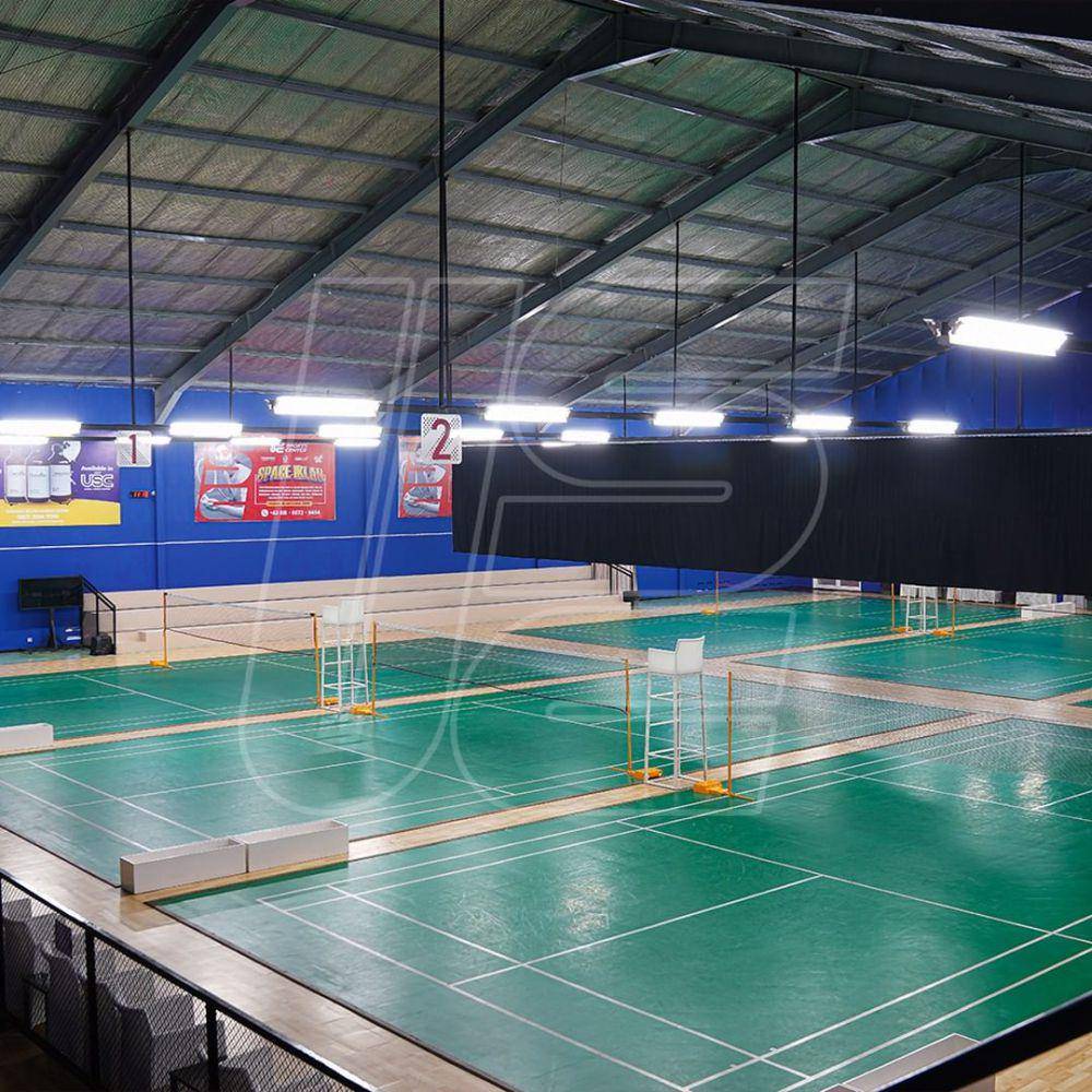 Arena lapangan bulutangkis di Unggul Sports Center Malang. Instagram/unggulsportscentermlg