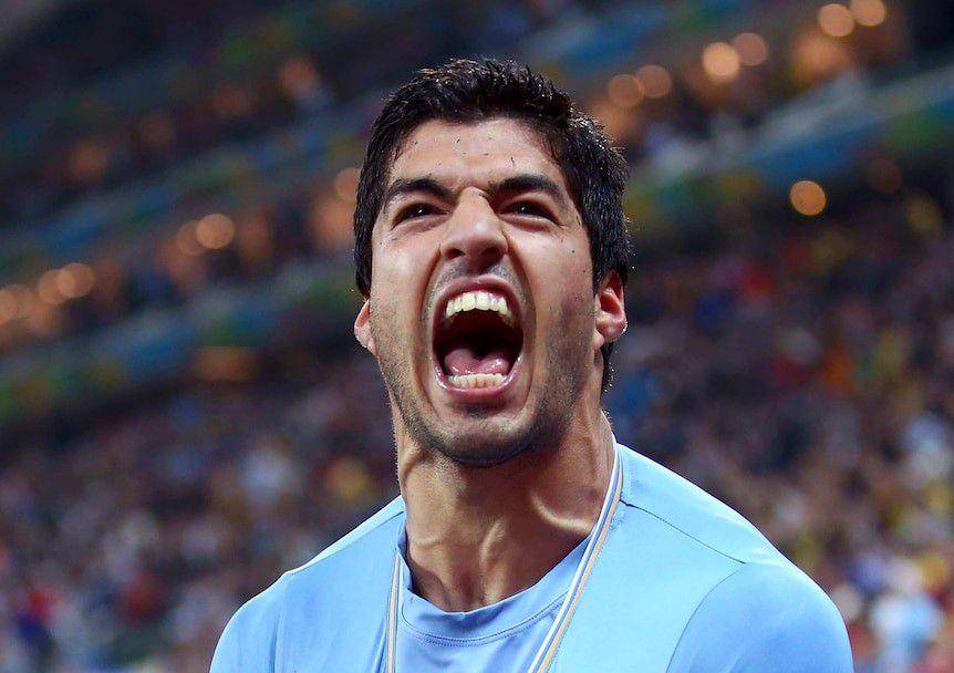 Ekspresi teriakan Luiz Suarez. (Abc.net.au)