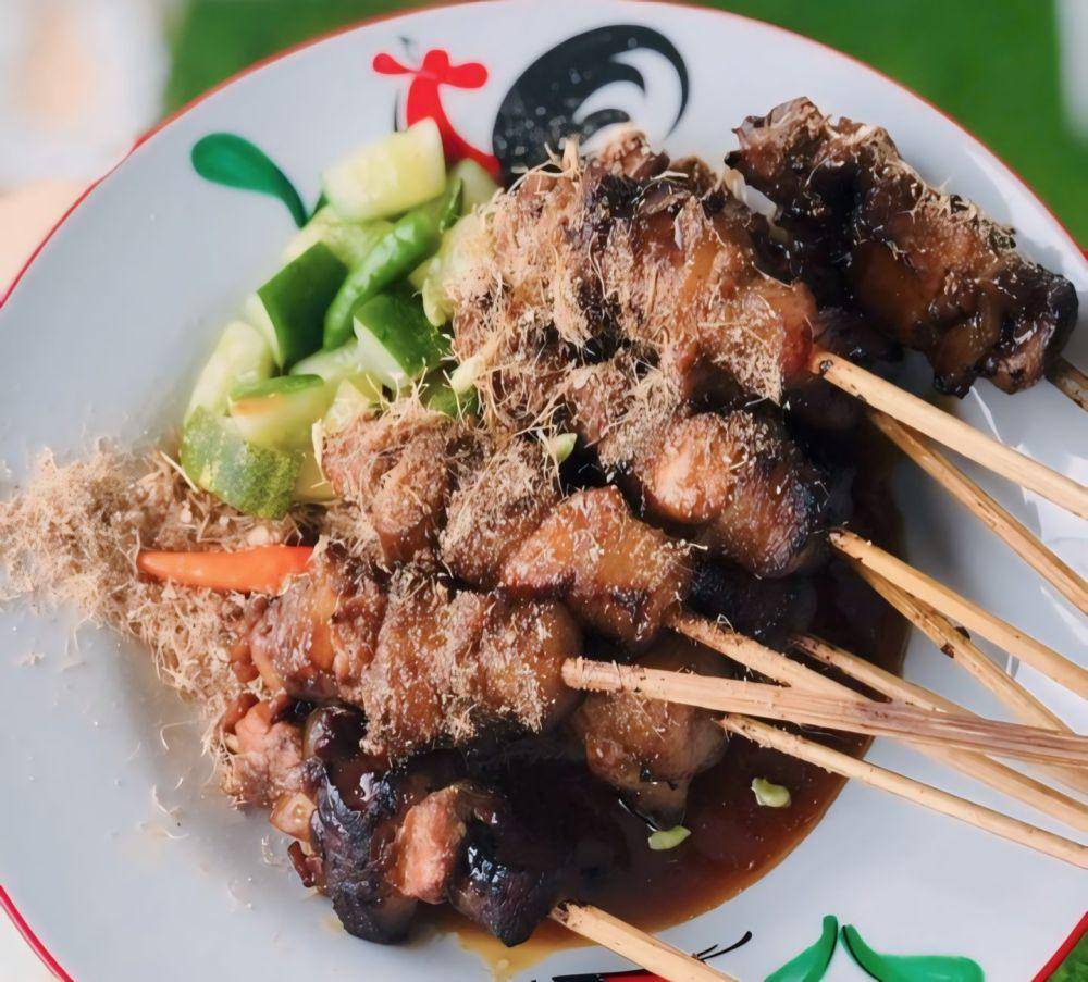 Sate Babi Ko Lim (instagram.com/siperutbulat)