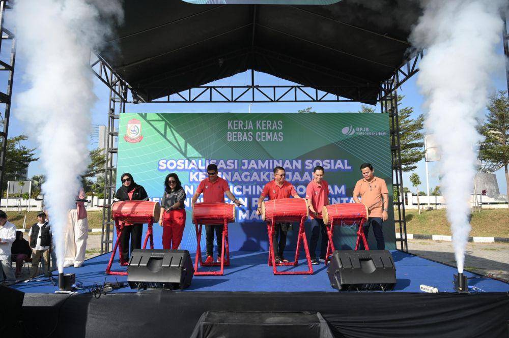 Potret kegiatan Sosialisasi Jaminan Sosial Ketenagakerjaan dan Launching Program Perlindungan Pekerja Rentan Kota Makassar, bertempat di Monumen MNEK Kota Makassar, Jumat (31/5). (dok. BPJS Ketenagakerjaan)