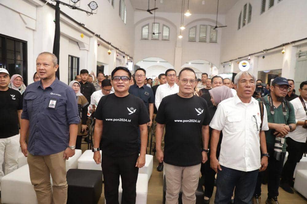 Pj Gubernur Sumut Hasanuddin dan Ketua KONI Sumut John Ismadi Lubis pada gelaran Road to PON 2024 di Pos Bloc Medan, Selasa (11/6/2024) (Dok.Diskominfo Sumut)