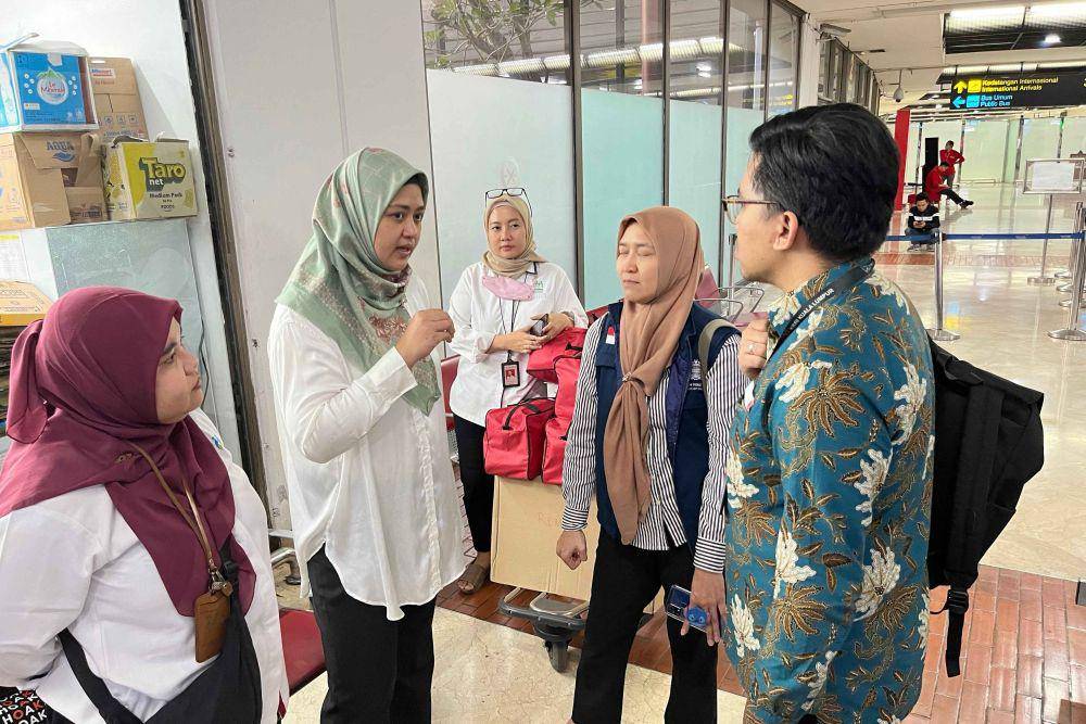 Kementerian Pemberdayaan Perempuan dan Perlindungan Anak (PPPA) fasilitasi 12 Warga Negara Indonesia (WNI) Pekerja Migran Indonesia (PMI) kelompok rentan yang dipulangkan dari Malaysia (dok. KemenPPPA)
