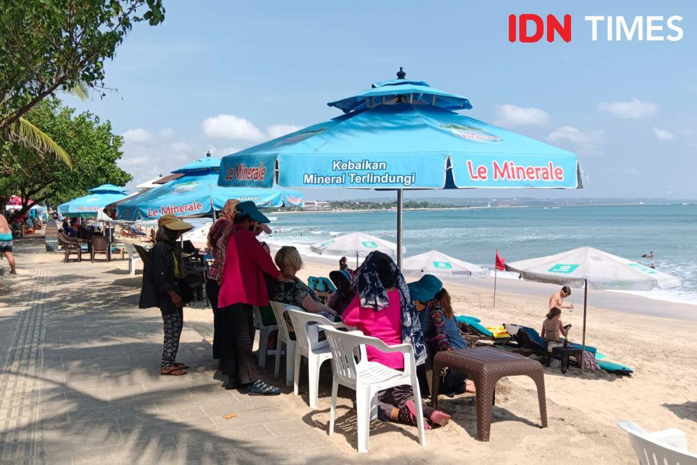 5 Potret Terkini Pantai Kuta, Masih Bikin Betah Sampai Malam