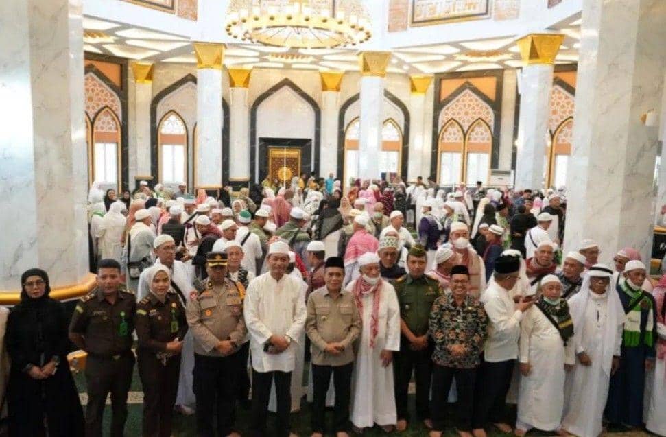 (Jemaah haji Ogan Ilir saat tiba di tanah air) IDN Times/istimewa
