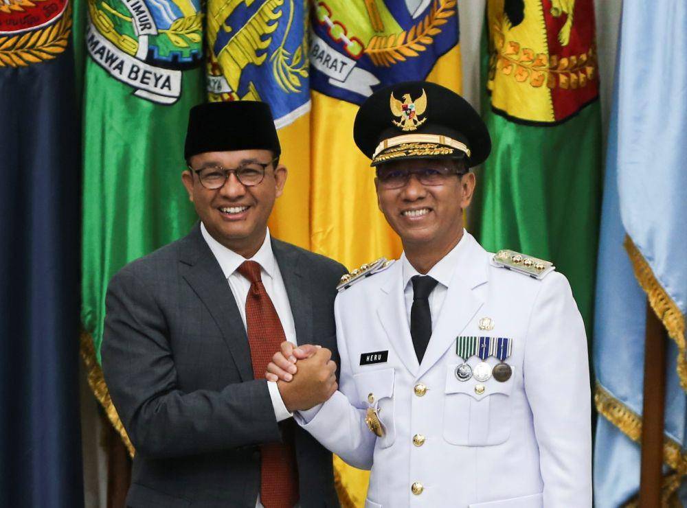 Anies Baswedan dan Heru Budi Hartono (ANTARA FOTO)