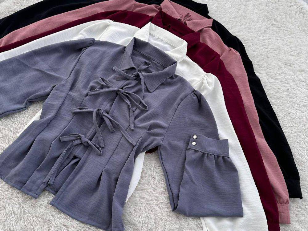 ilustrasi blouse dengan aksen pita (shopee.com/RumahDiaryFashio)