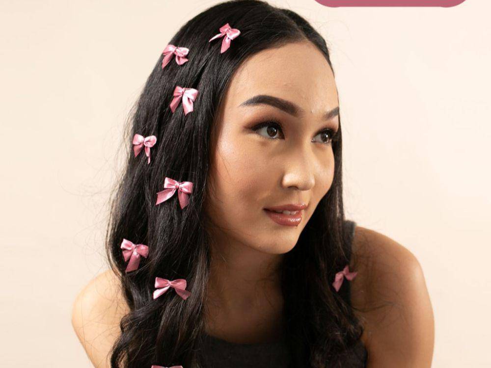 ilustrasi jepitan pita (shopee.com/papipustudio)