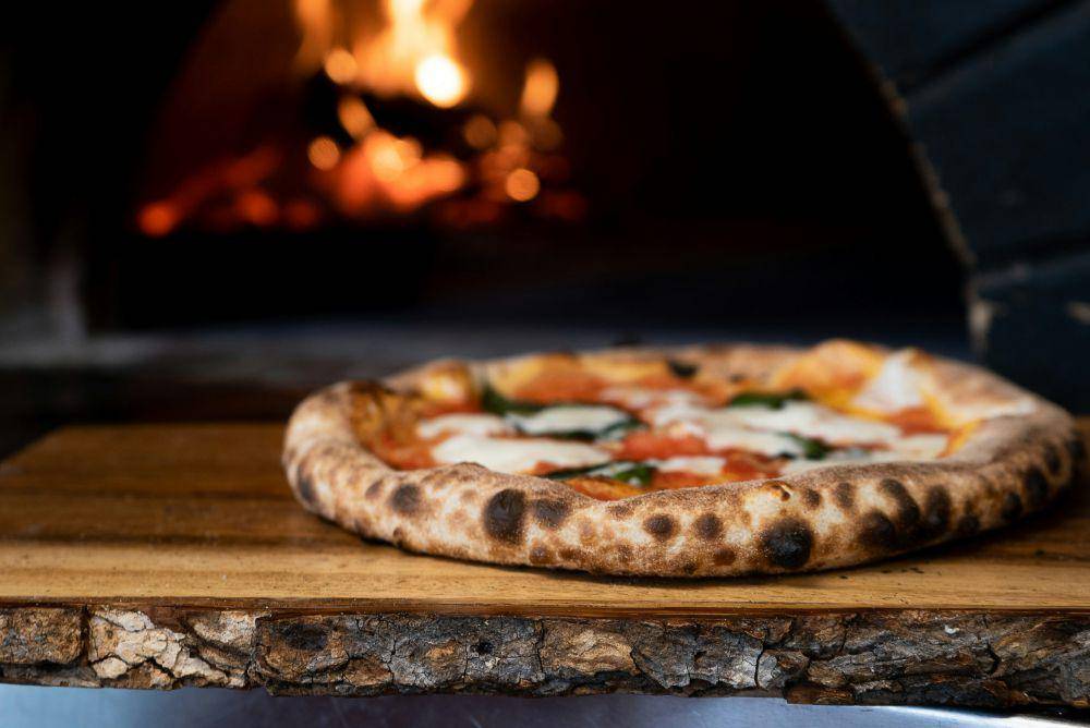 ilustrasi pizza (unsplash.com/Nik Owens)