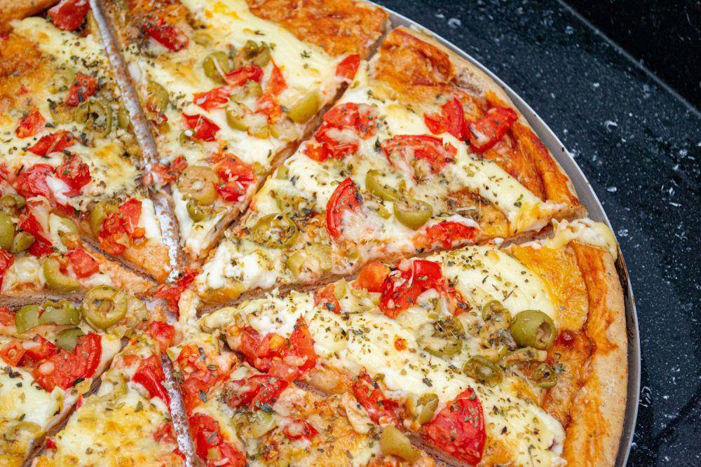 Ilustrasi topping pizza (unsplash.com/jkakaroto)