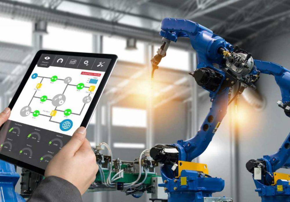 ilustrasi penerapan IoT pada Industri Manufaktur (canva.com)