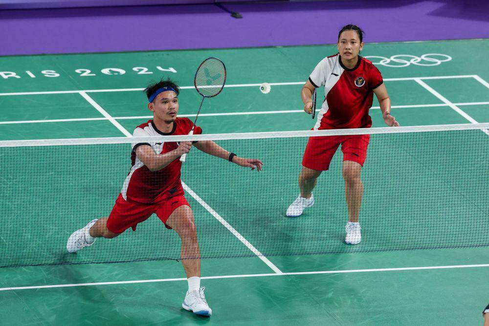 Ganda campuran Indonesia, Rinov Rivaldy/Pitha Haningtyas Mentari memenangkan pertandingan pertama mereka di Olimpiade 2024 Paris (PBSI/Badmintonphoto/Yohan Nonotte)