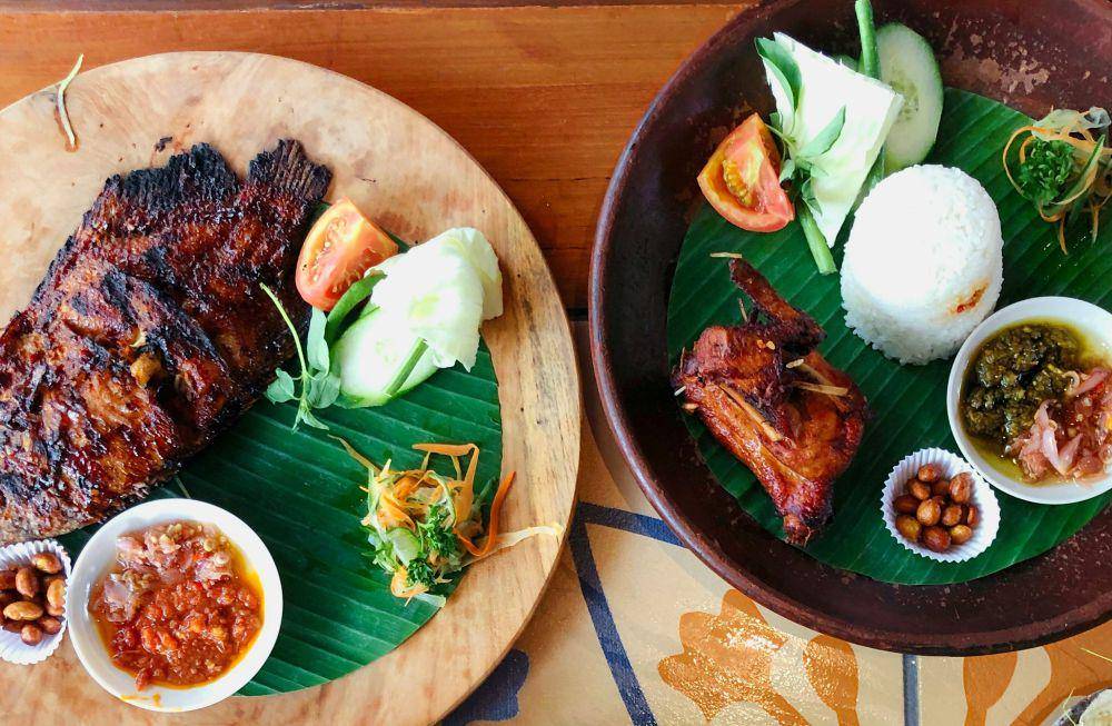 Ilustrasi ikan bakar dan ayam bakar. Unsplash/Shibupavizhageorge