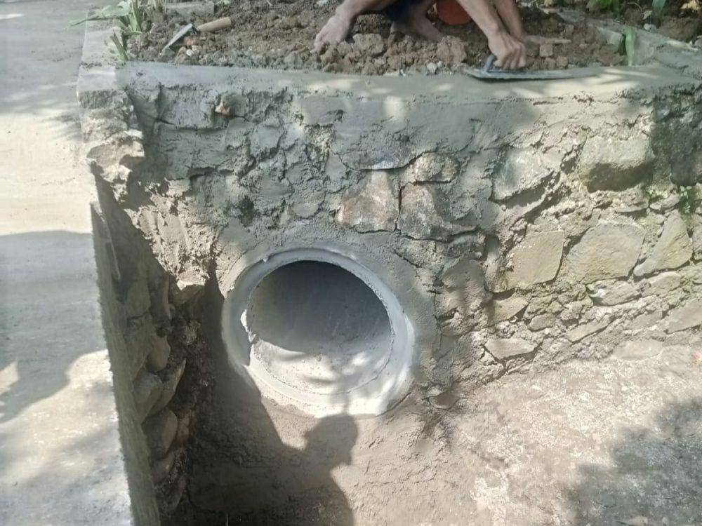 KSO Foster Oil & Energy dan PT Migas Bekasi bangun crossing saluran air untuk cegah banjir. (Istimewa)
