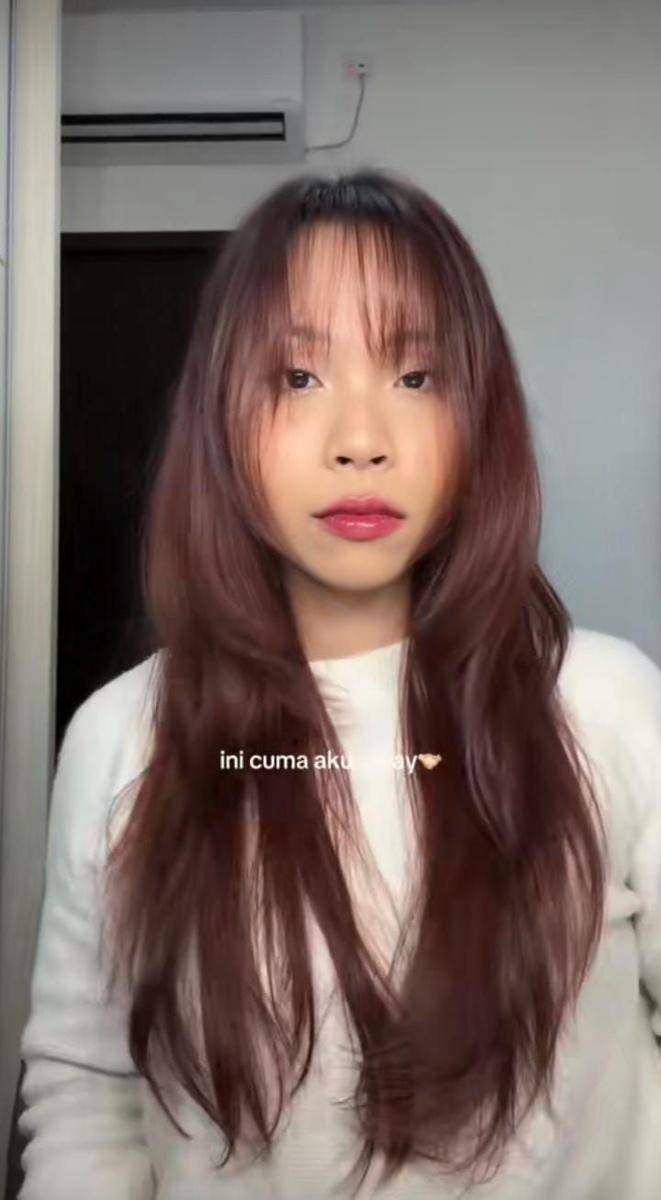 model butterfly haircut (tiktok.com/reginanugroho)