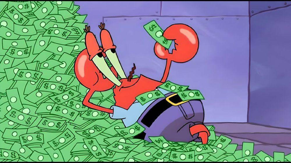 Mr. Krabs rebahan dengan uangnya yang berharga. (dok. Nickelodeon/SpongeBob SquarePants)