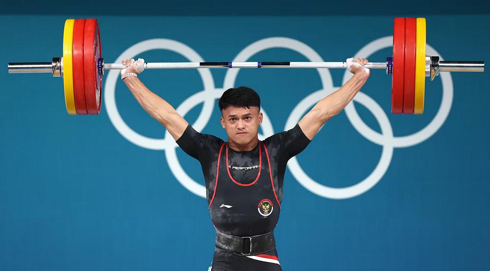 Rizki Juniansyah, atlet angkat besi Indonesia (olympics.com)