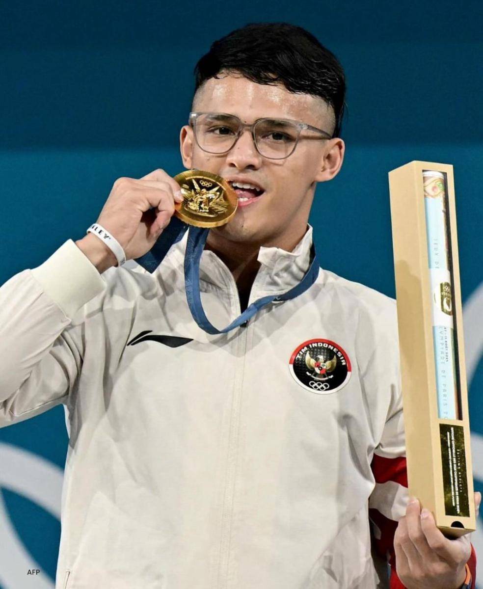 Atlet angkat besi Indonesia, Rizki Juniansyah meraih medali emas dari Olimpiade 2024 Paris (instagram.com/rjuniansyah_)