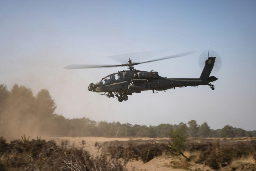 ilustrasi helikopter Apache (Unsplash.com/Paul Jespers)