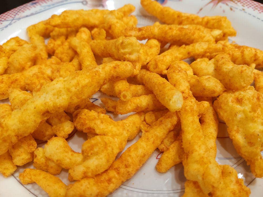 ilustrasi corn twist (vecteezy.com/aliraza45000)