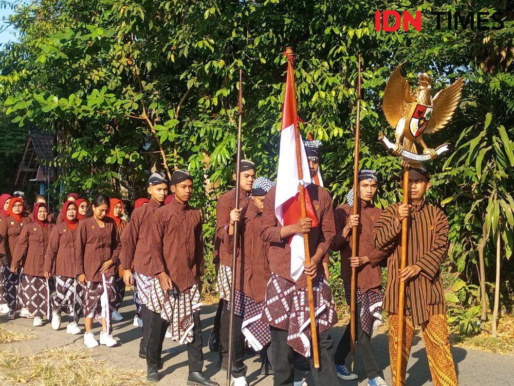 Peringatan HUT RI, Warga Kampung Pancasila Gelar Kirab dan Upacara