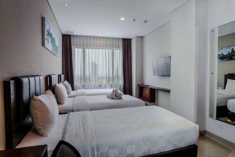Kamar tipe superior tripple di PrimeBiz Hotel. (pbsu.pphotels.com)